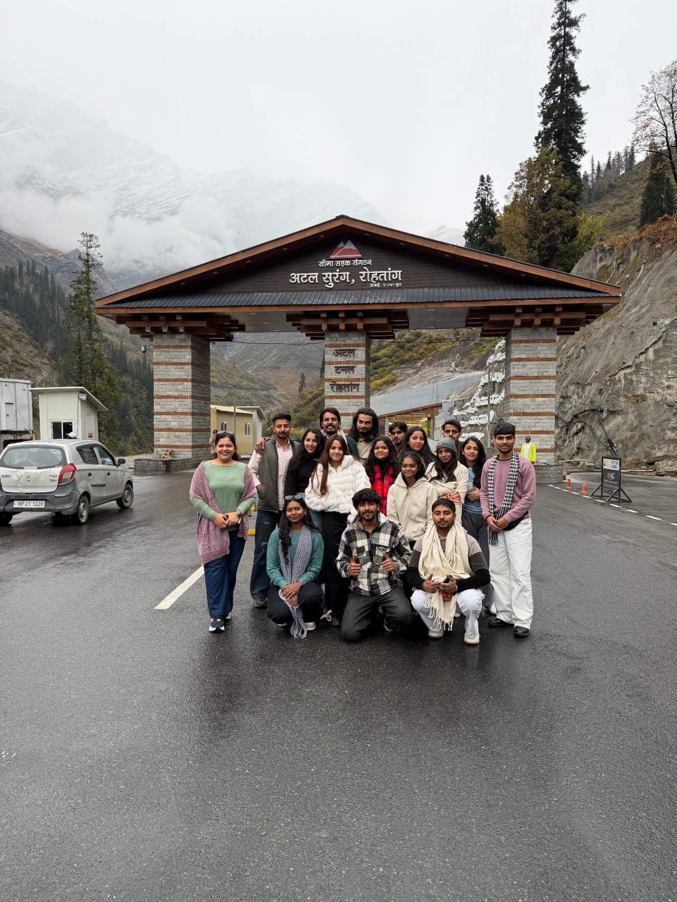 The group at the Atal Tunnel Rohtang entrance gate in the mist