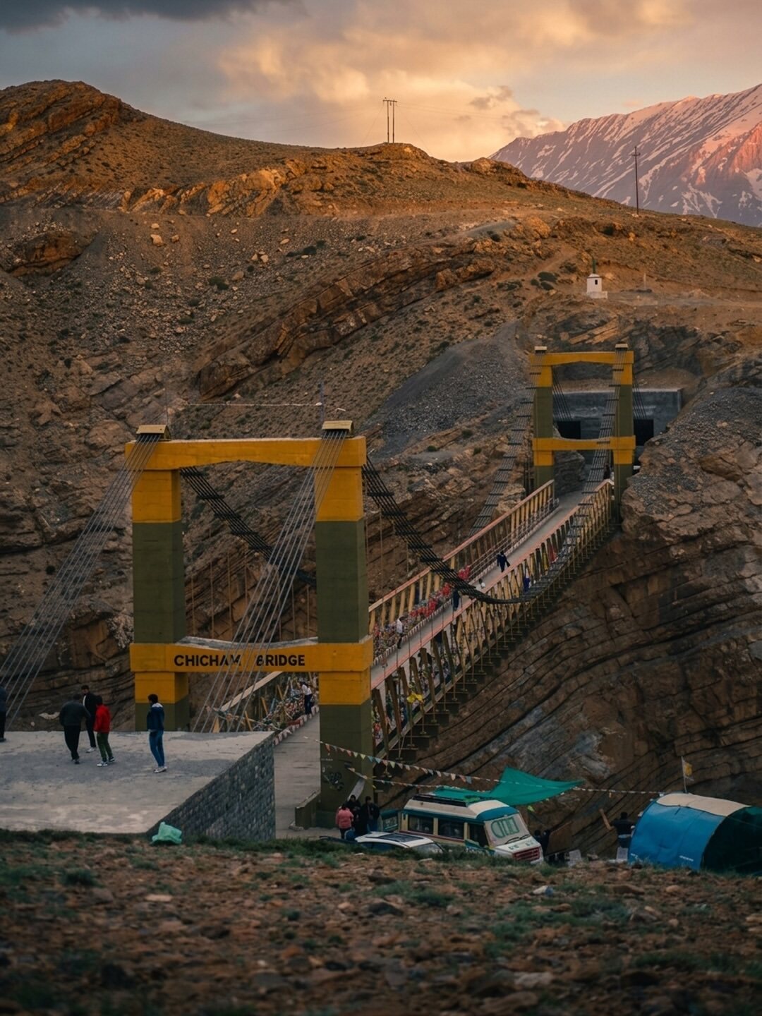 Chicham Bridge glowing at sunset in Spiti